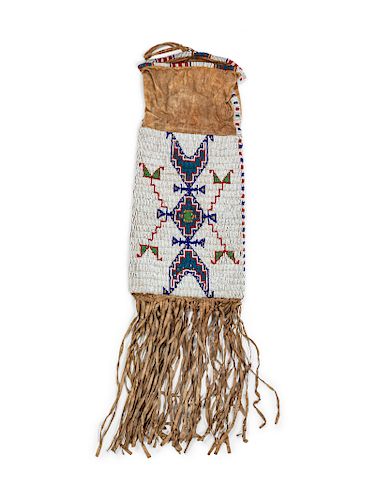 Sioux Beaded Hide Tobacco Bag
overall length 26 inches