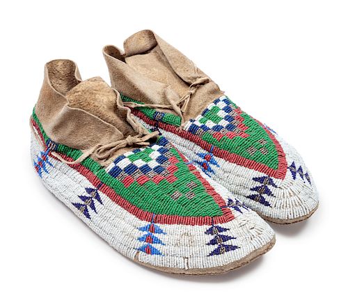 Cheyenne Beaded Hide Moccasins
length 11 inches