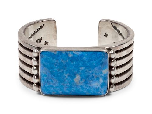 Orville Tsinnie
(Dine, b. 1943)
Sterling silver cuff bracelet with Lapis cabochon