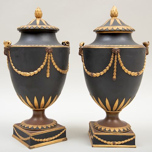 Pair of Wedgwood Black Basalt Bronze and Gilt-Decorated Vases and Covers