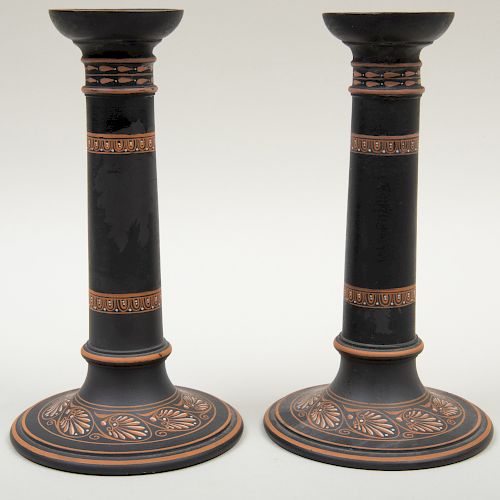 Pair of Wedgwood Black Basalt Encaustic Decorated Candlesticks