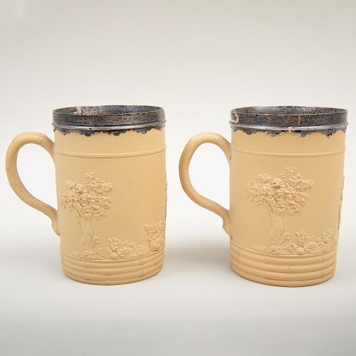 Two Wedgwood Caneware Silver-Mounted Mugs