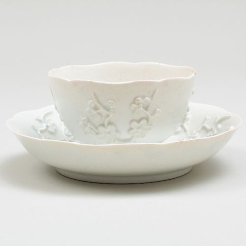 Bow White Glazed Porcelain Teabowl And Saucer with Applied Prunus Decoration