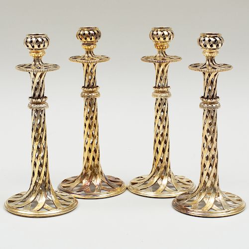 Set of Four Tiffany & Co. Silver-Gilt Candlesticks
