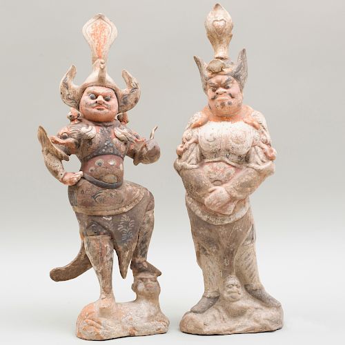 Two Chinese Painted Pottery Figures of Tomb Guardians
