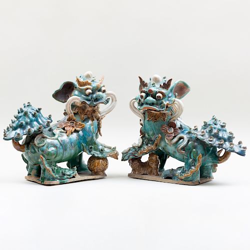 Pair of Chinese Ming Style Pottery Buddhistic Lions