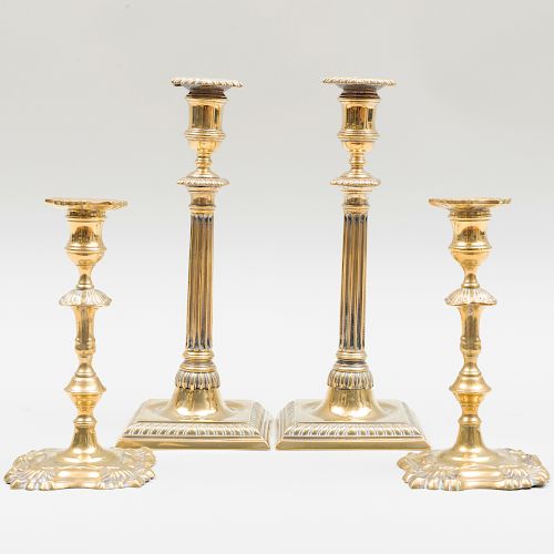Two Pairs of George III Brass Candlesticks