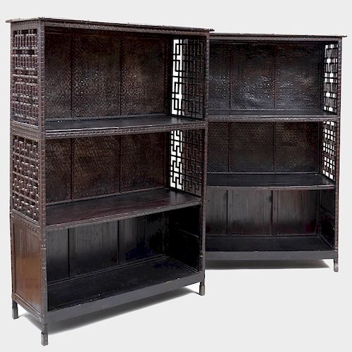 Pair of Asian Black Painted Bamboo, Woven Reed and Wood Fretwork Open Cabinets