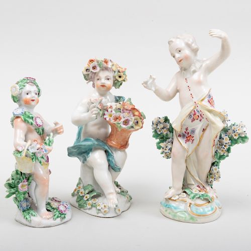 Group of Three English Porcelain Figures of Putti with Flowers, Probably Bow