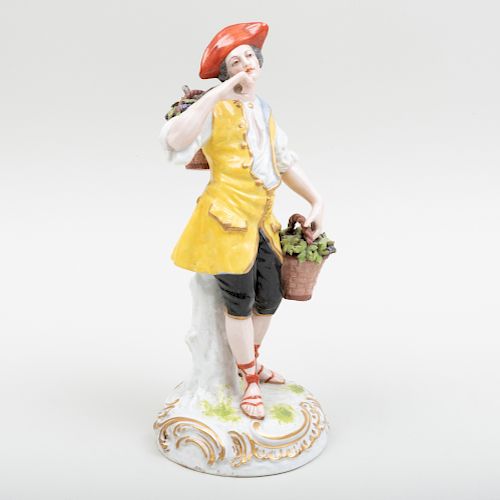 French Porcelain Figure in a Yellow Vest Emblematic of Fall