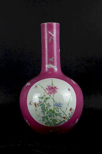 A Pink Ground Incised Famille Rose Bottle Vase.