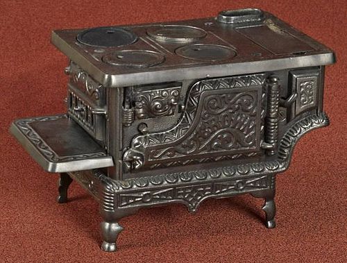 Grey Iron cast iron Crown toy stove, 6 3/4'' h.,