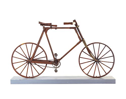 An American Oak and Metal "Boneshaker" Bicycle
Height 39 x width 65 x depth 19 inches.