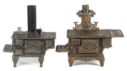 Two Kenton cast iron toy stoves, to include a Ma