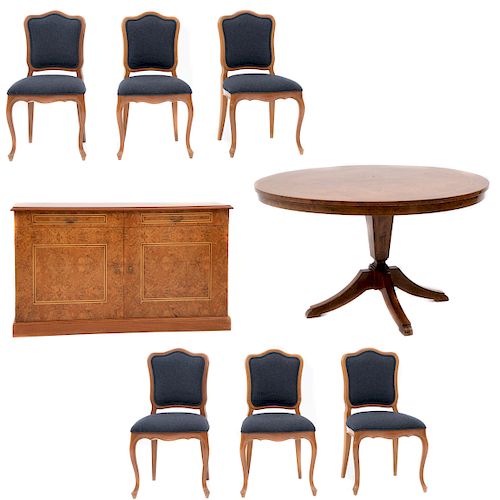 Comedor. Siglo XX. Consta de: Juego de 6 sillas. Estructura de madera laqueada, mesa y trinchador con enchapado de raíz.Pz: 8
