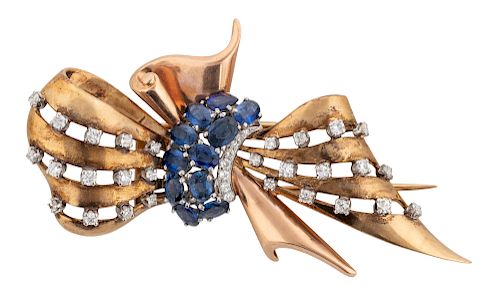 AN ART DECO YELLOW AND ROSE GOLD, SAPPHIRE AND DIAMOND PIN