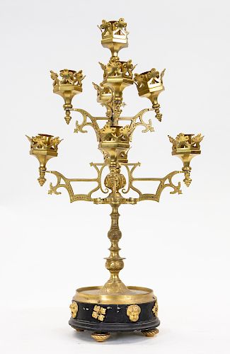 A BRASS GOTHIC REVIVAL CANDELABRA, LATE 20TH CENTURY