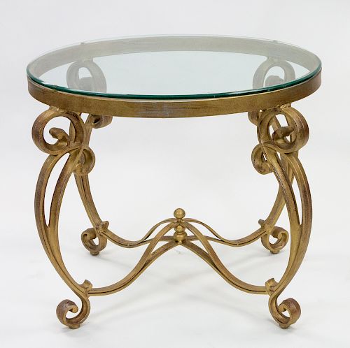 A CONTEMPORARY GLASS-TOP TABLE