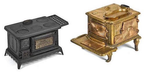 Two cast iron toy stoves, to include an Orr, Pain