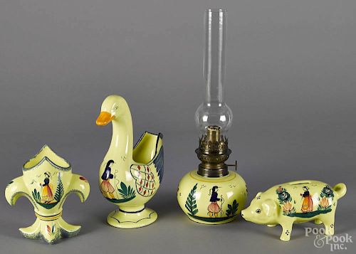 HB Henriot of Quimper, France, oil lamp, 15 3/4'' h., 20th c., together with a figural swan