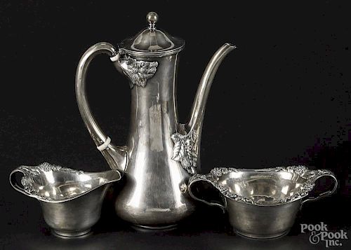 Tiffany & Co. sterling silver three-piece tea service with raspberry decoration, teapot - 8 1/2'' h.