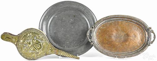 Embossed brass bellows, 19th c., 19 1/2'' l., together with an English pewter charger, 15'' dia.