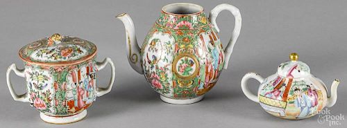 Two Chinese export rose medallion teapots, 19th c., 5 1/2'' h. and 3 1/2'' h.