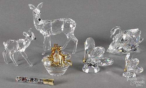 Swarovski crystal figures, to include two butterflies, two deer, a swan, and a secrets set