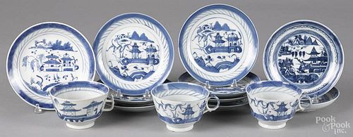 Canton porcelain, 19th/20th c., to include three tea cups and ten small plates.