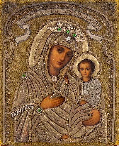 A RUSSIAN ICON OF THE MOTHER OF GOD GORGOEPIKOOS WITH EMBROIDERED AND HARDSTONE OKLAD, 19TH CENTURY 