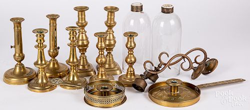 Four pairs of Victorian brass candlesticks