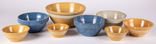 Eight yellowware and stoneware mixing bowls