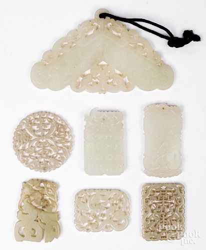 Seven Chinese carved jade medallions