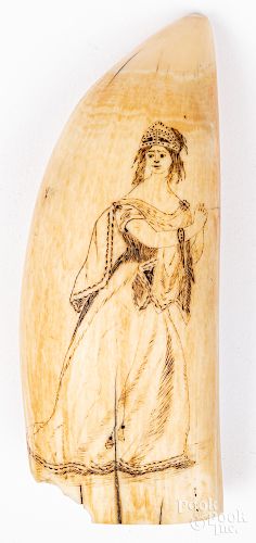 Scrimshaw decorated whale tooth