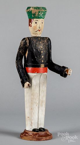 Carved and painted soldier figure