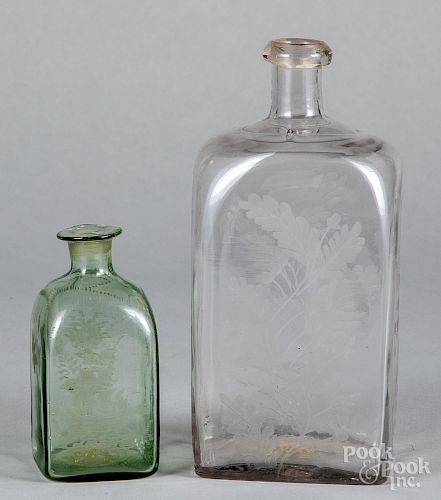 Two etched glass bottles