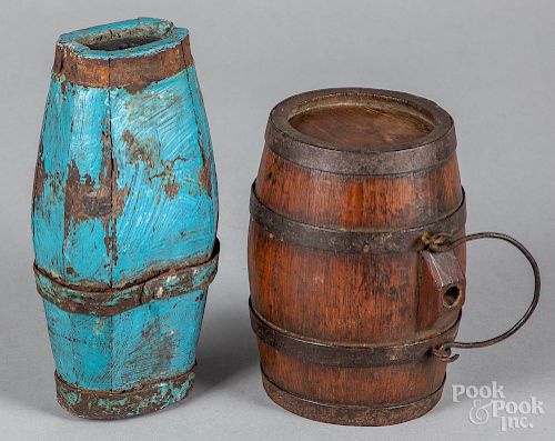 Two iron-banded wood kegs
