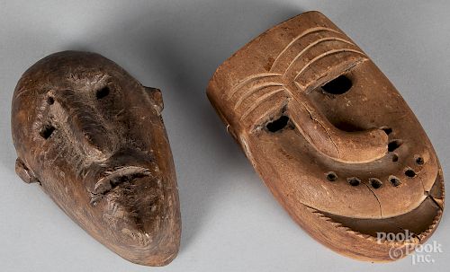 Two Native American Indian carved false face mask