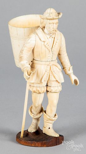Carved ivory figure of a German gentleman, 19th c
