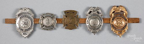 Five fire department badges