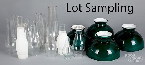 Collection of glass lamp shades and chimneys
