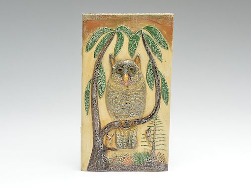 Carved wooden plaque of owl in tree with two smaller birds, Oscar Peterson, Cadillac, Michigan.