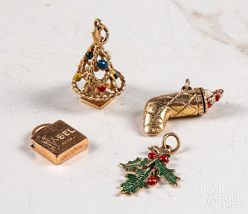 Four 14K gold charms