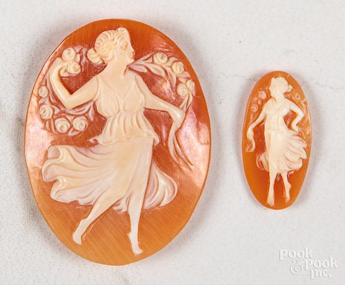 Two loose hand carved cameos