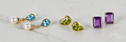 Three pairs of 14K gold gemstone earrings