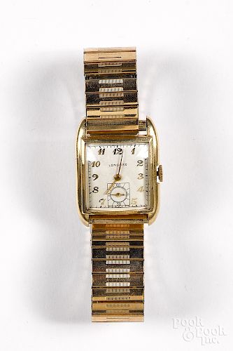 Longines 14K gold wrist watch.