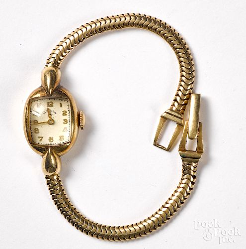 Lady Elgin 14K gold wristwatch.