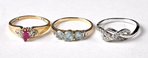 Three 10K gold and colored stone rings
