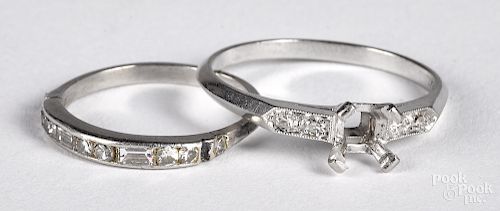 Two platinum and diamond rings