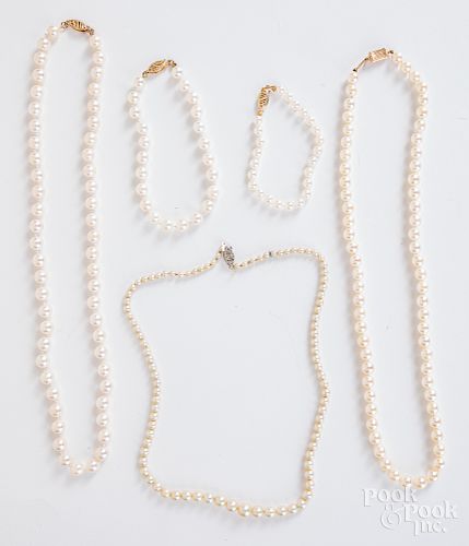 Three pearl necklaces, together with two bracelet